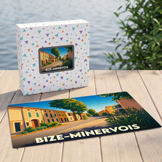 Puzzle souvenir de la ville de Bize-Minervois avec une illustration stylisée et sa boîte assortie.