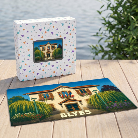 Puzzle souvenir de la ville de Blyes avec une illustration stylisée d'un bâtiment fleuri.