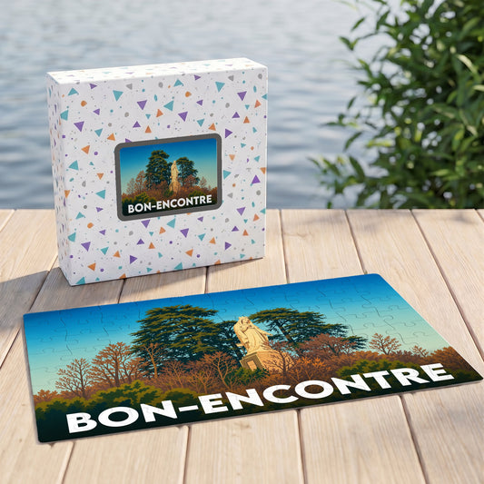 Puzzle souvenir de la ville de Bon-Encontre illustrant une statue dans un parc paysager.