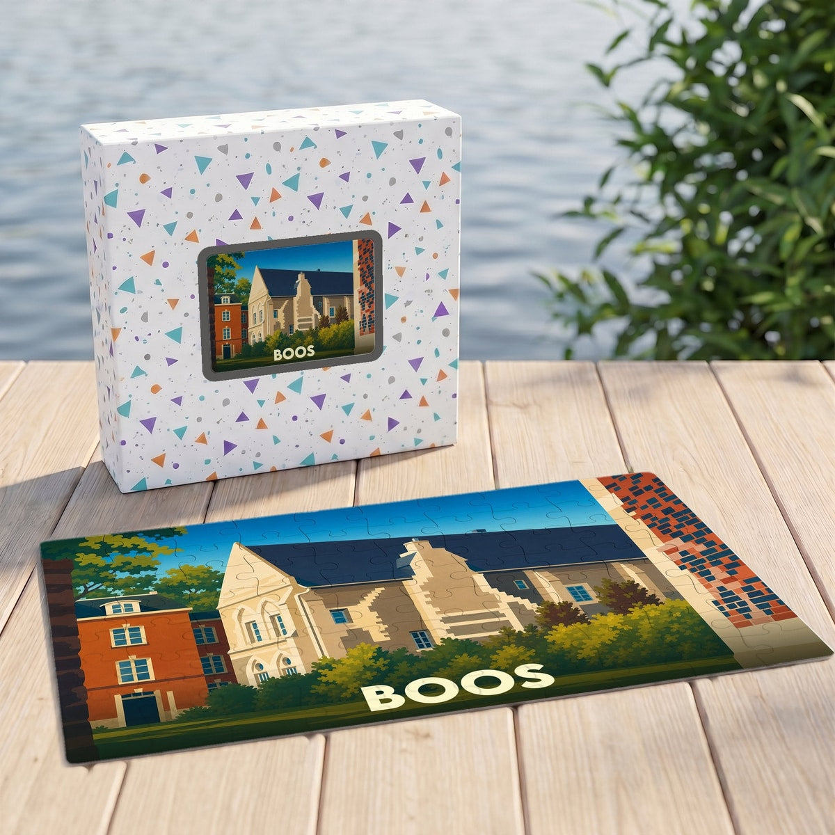 Puzzle souvenir de la ville de Boos avec une illustration stylisée d'un bâtiment historique.