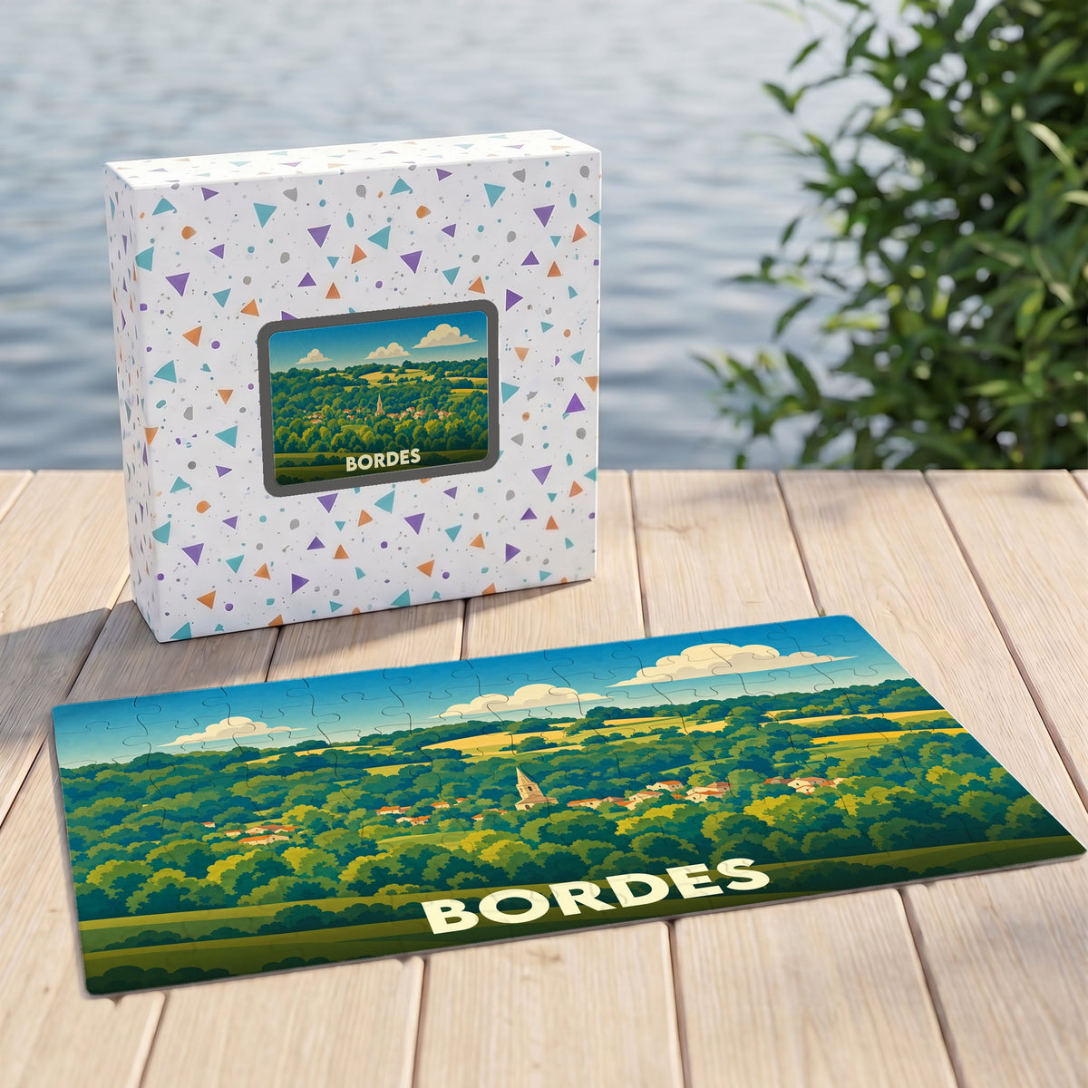 Puzzle souvenir de la ville de Bordes avec une illustration paysagère stylisée.