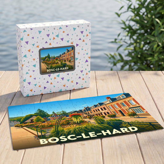 Puzzle souvenir de la ville de Bosc-le-Hard avec une illustration colorée et stylisée de ses bâtiments et jardins.
