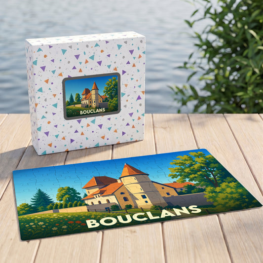 Puzzle souvenir de la ville de Bouclans avec une illustration stylisée de son château présentée à côté de sa boîte.