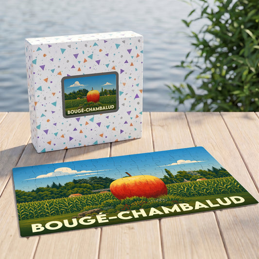 Puzzle souvenir de la ville de Bougé-Chambalud avec une illustration stylisée d'une pomme géante dans un champ.