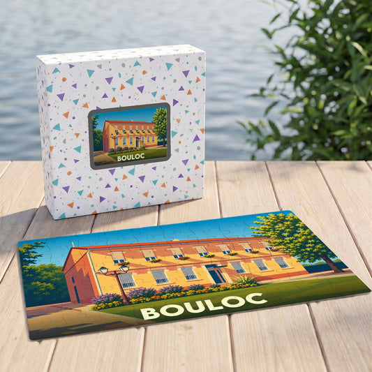 Puzzle souvenir de la ville de Bouloc avec une illustration stylisée d'un bâtiment coloré.