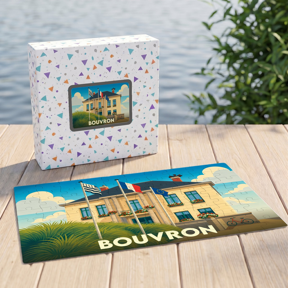 Puzzle souvenir de la ville de Bouvron avec une illustration stylisée d'un bâtiment officiel et de ses drapeaux.