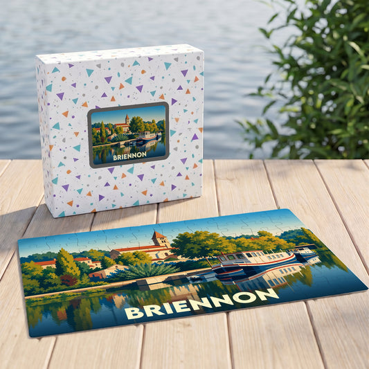 Puzzle souvenir de la ville de Briennon avec une illustration stylisée de son port et de son église.