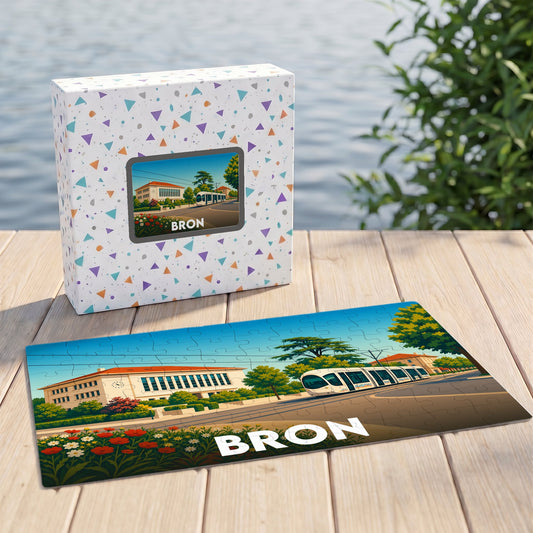 Puzzle souvenir de la ville de Bron avec une illustration stylisée représentant un tramway et l'hôtel de ville.