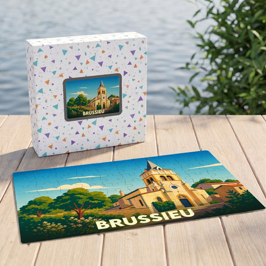 Puzzle souvenir de la ville de Brussieu avec une illustration stylisée d'une église sous un ciel bleu.