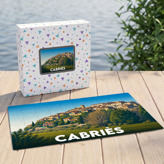 Puzzle souvenir de la ville de Cabriès avec une illustration stylisée d'un village perché.