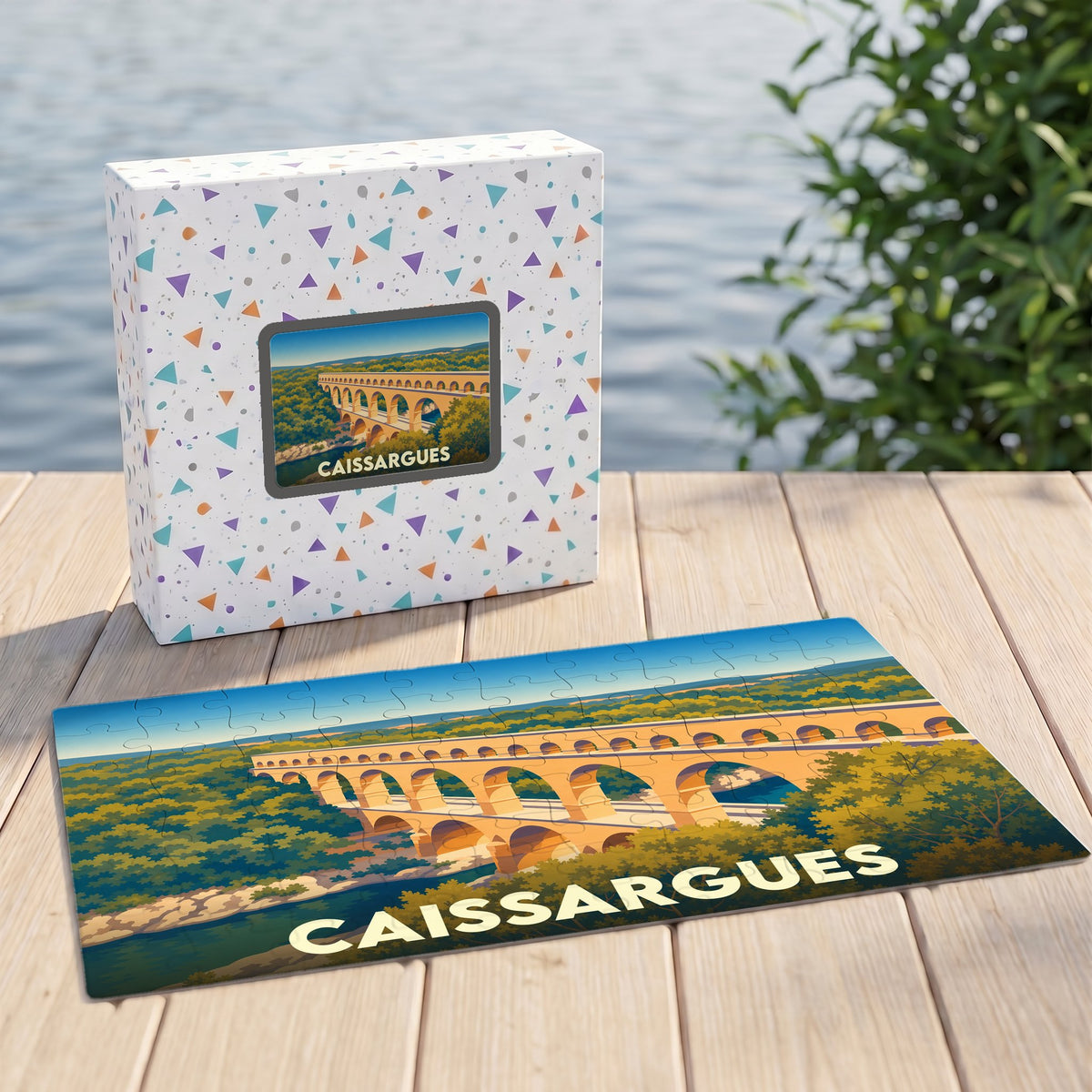 Puzzle souvenir de la ville de Caissargues représentant son aqueduc avec une illustration stylisée.