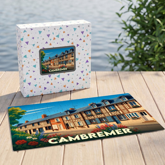 Puzzle souvenir de la ville de Cambremer avec une illustration stylisée de maisons à colombages.