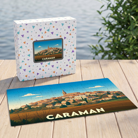 Puzzle souvenir de la ville de Caraman avec une illustration stylisée d'un paysage urbain.