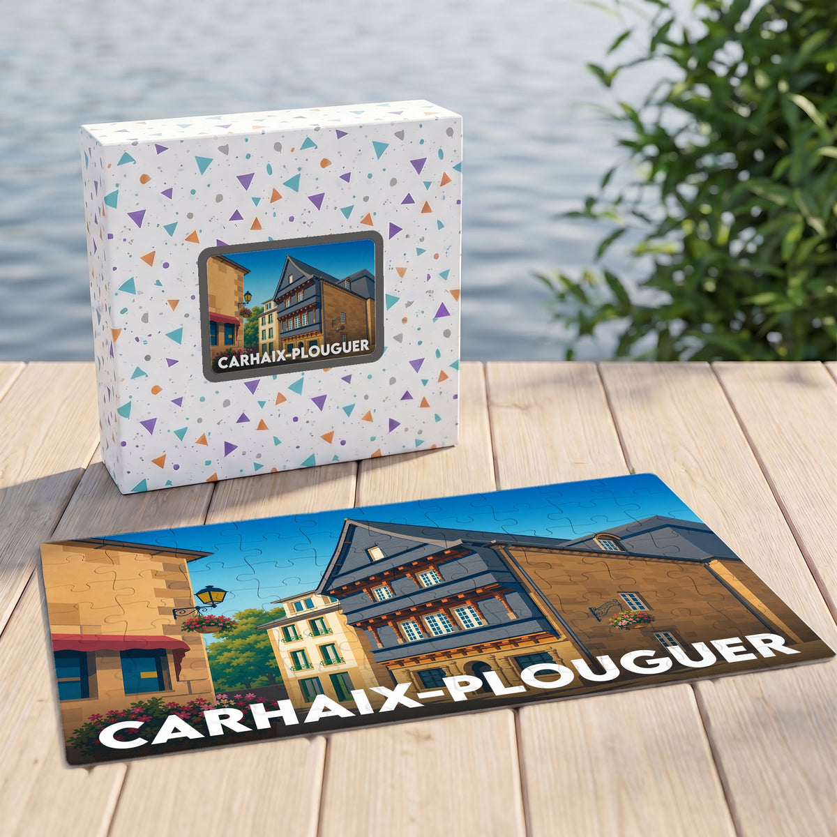 Puzzle souvenir de la ville de Carhaix-Plouguer avec une illustration stylisée de ses maisons traditionnelles.