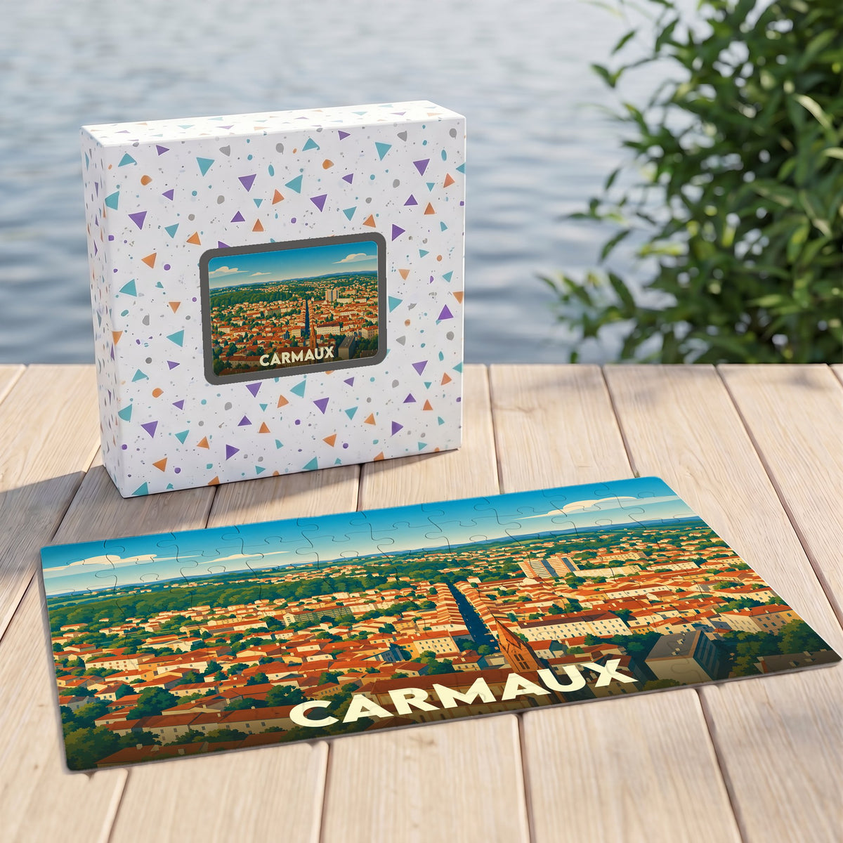 Puzzle souvenir de la ville de Carmaux avec une illustration panoramique stylisée.