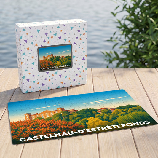 Puzzle souvenir de la ville de Castelnau-d'Estrétefonds représentant son château entouré de végétation.