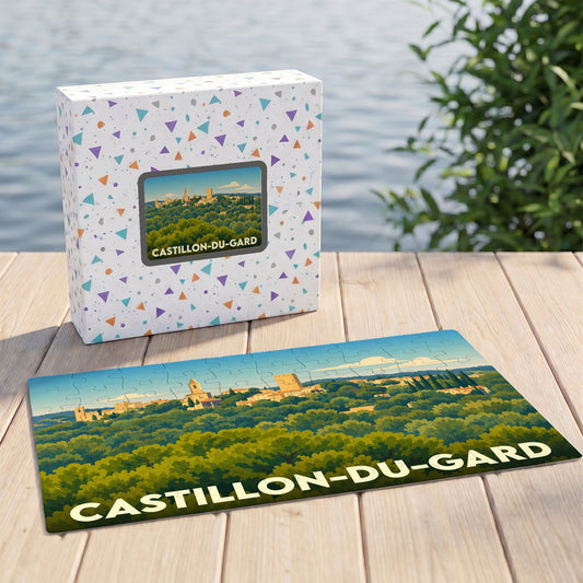 Puzzle souvenir de la ville de Castillon-du-Gard avec une illustration stylisée de son panorama.