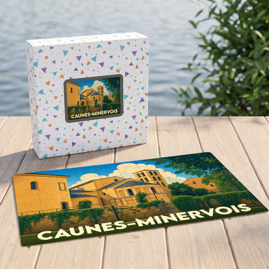 Puzzle souvenir de la ville de Caunes-Minervois avec une illustration stylisée et colorée de son abbaye.