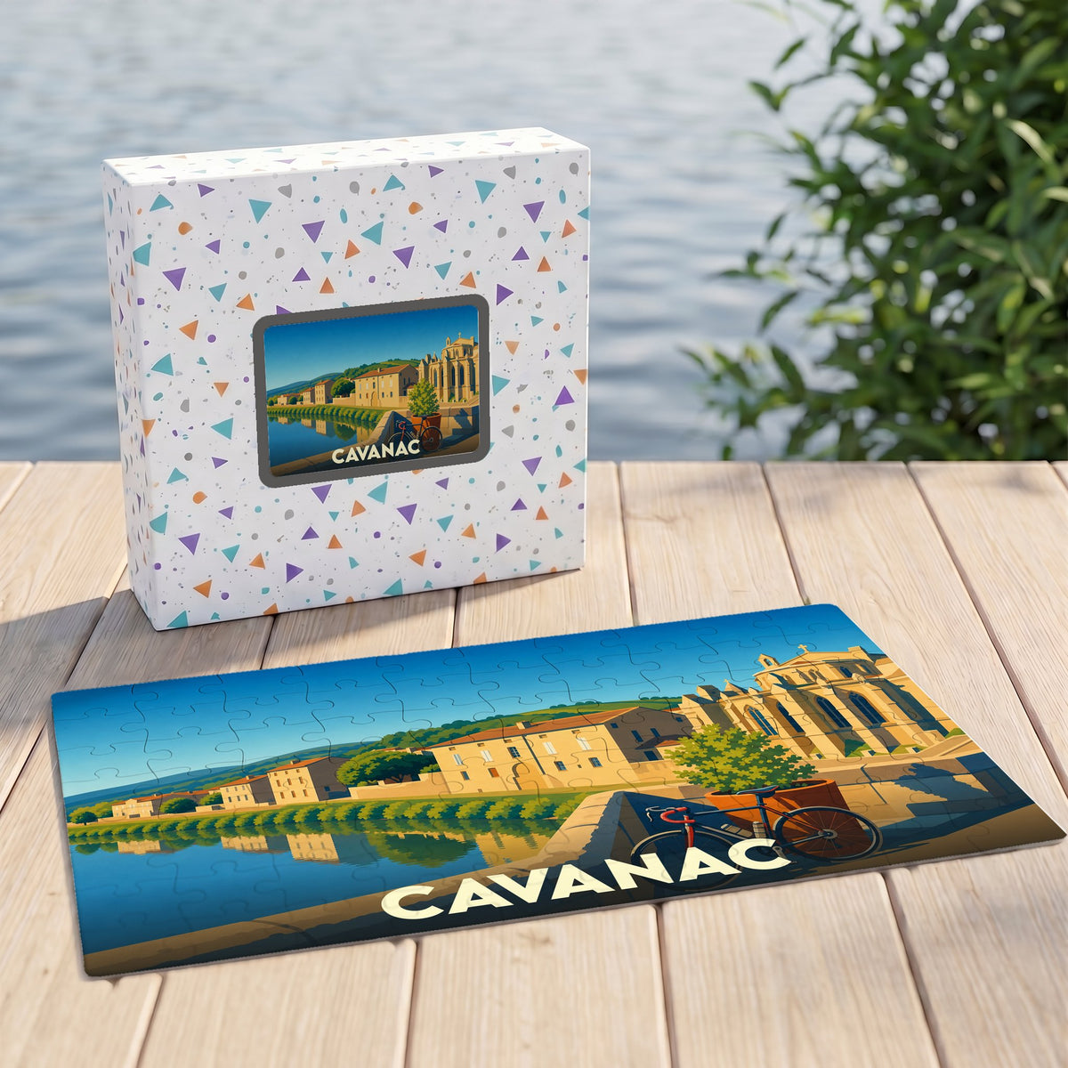Puzzle souvenir de la ville de Cavanac avec une illustration de paysage urbain au bord de l'eau.