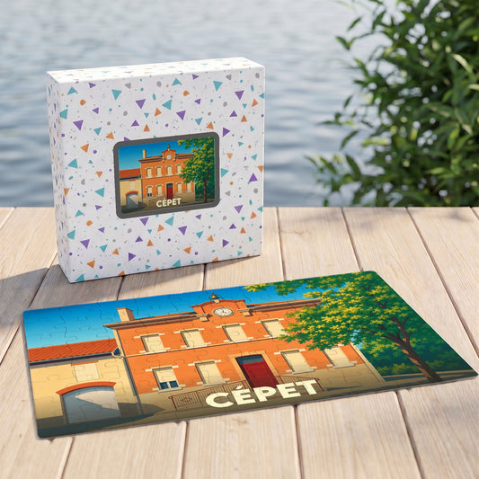 Puzzle souvenir de la ville de Cépet avec une illustration stylisée de sa mairie.