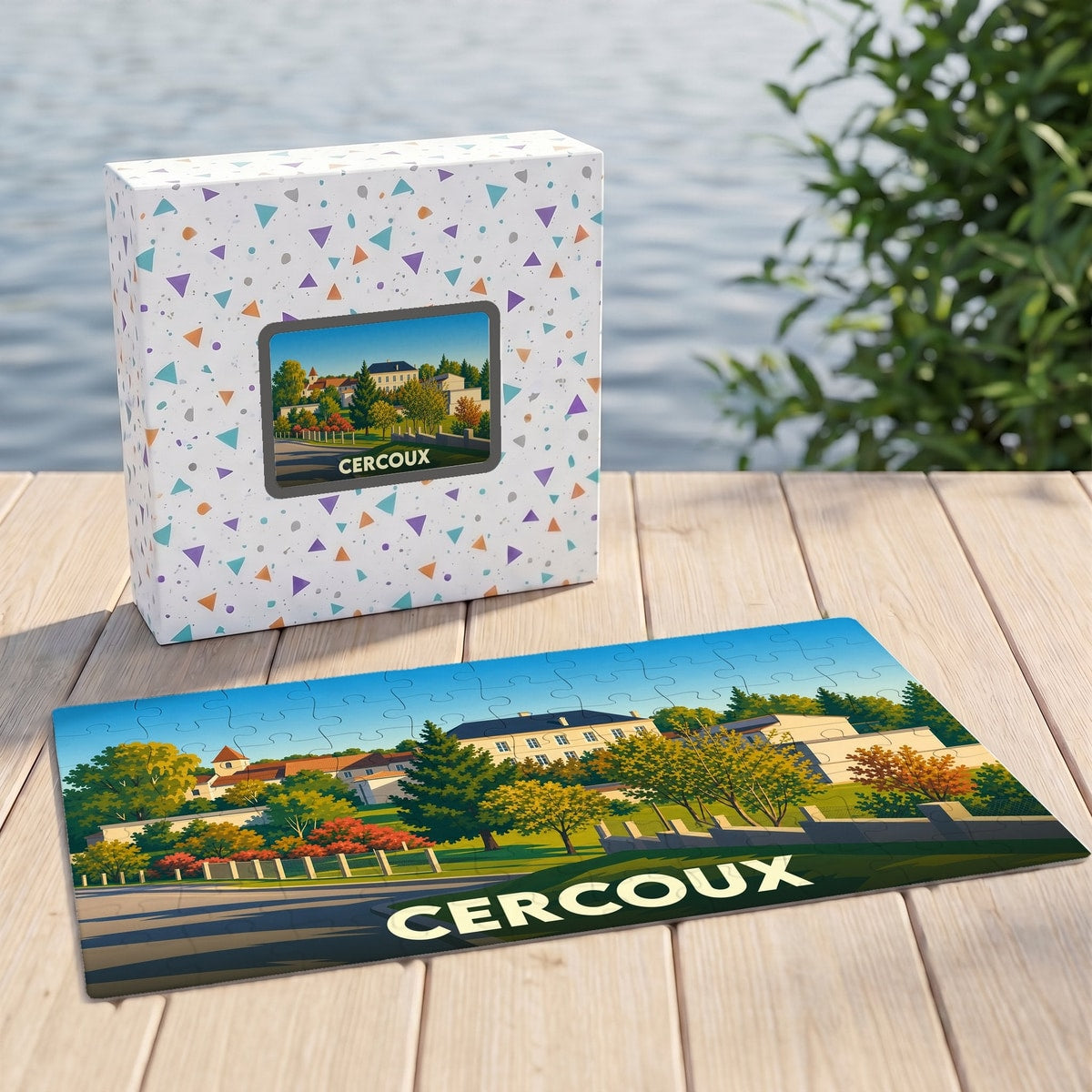 Puzzle souvenir de la ville de Cercoux avec son illustration paysagère stylisée et sa boîte assortie.