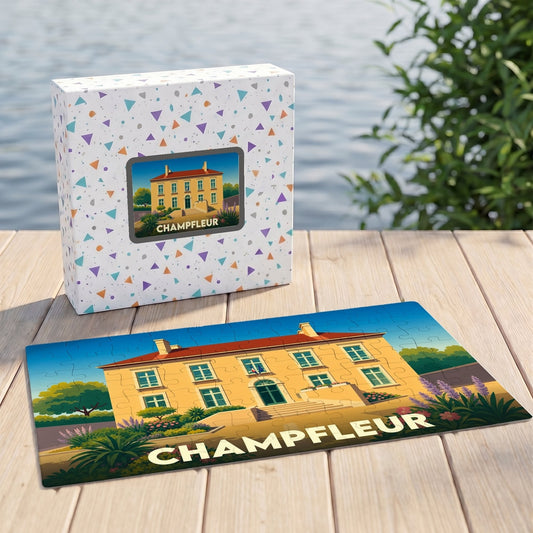 Puzzle souvenir de la ville de Champfleur avec une illustration stylisée d'une grande demeure jaune.