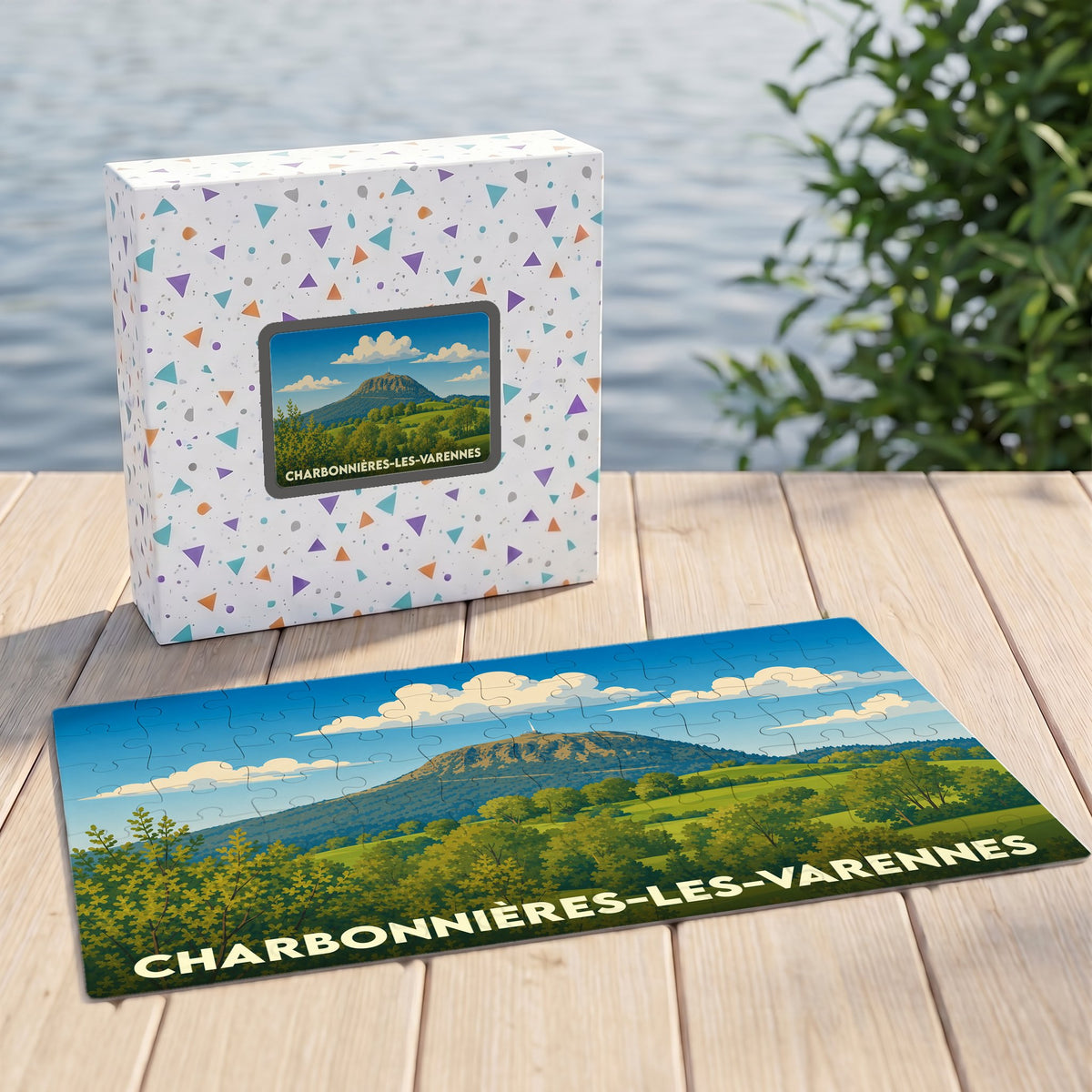 Puzzle souvenir de la ville de Charbonnières-les-Varennes avec une illustration de paysage vallonné.