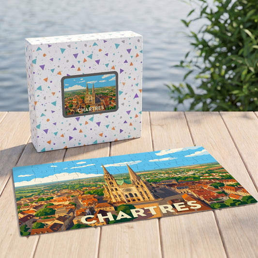 Puzzle souvenir de la ville de Chartres avec une illustration stylisée de sa cathédrale et de ses toits.