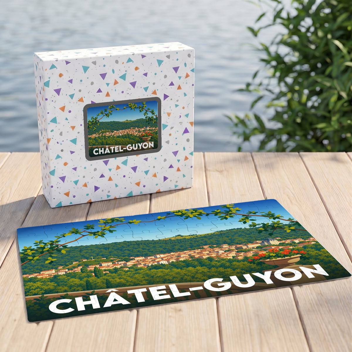 Puzzle souvenir de la ville de Châtel-Guyon représentant un paysage panoramique illustré.
