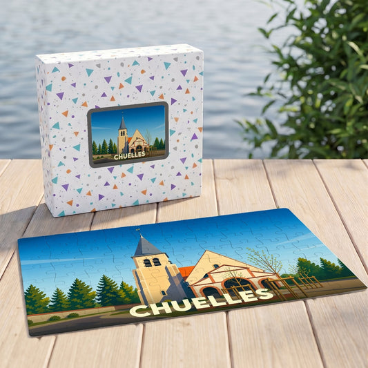 Puzzle souvenir de la ville de Chuelles avec une illustration stylisée d'une église et de son clocher.