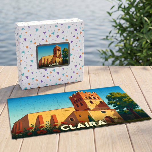 Puzzle souvenir de la ville de Claira illustrant son église dans un style graphique épuré.