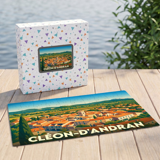 Puzzle souvenir de la ville de Cléon-d'Andran présentant une illustration panoramique colorée de ses toits.