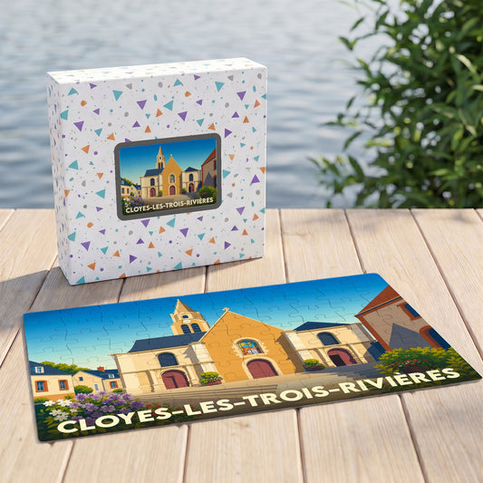 Puzzle souvenir de la ville de Cloyes-les-Trois-Rivières illustrant une église stylisée sous un ciel bleu.