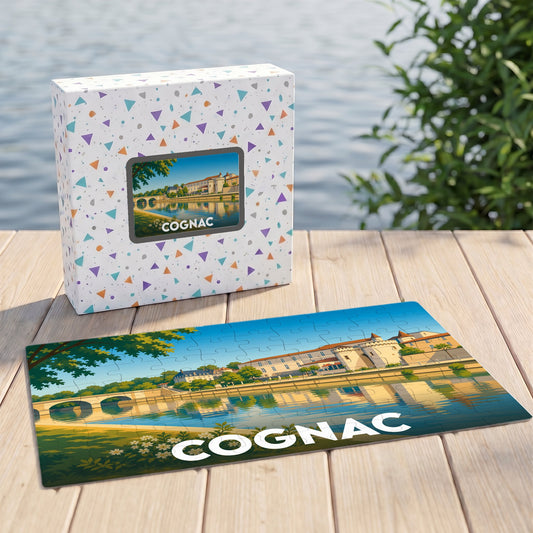 Puzzle souvenir de la ville de Cognac illustré d'un paysage urbain au bord de l'eau.