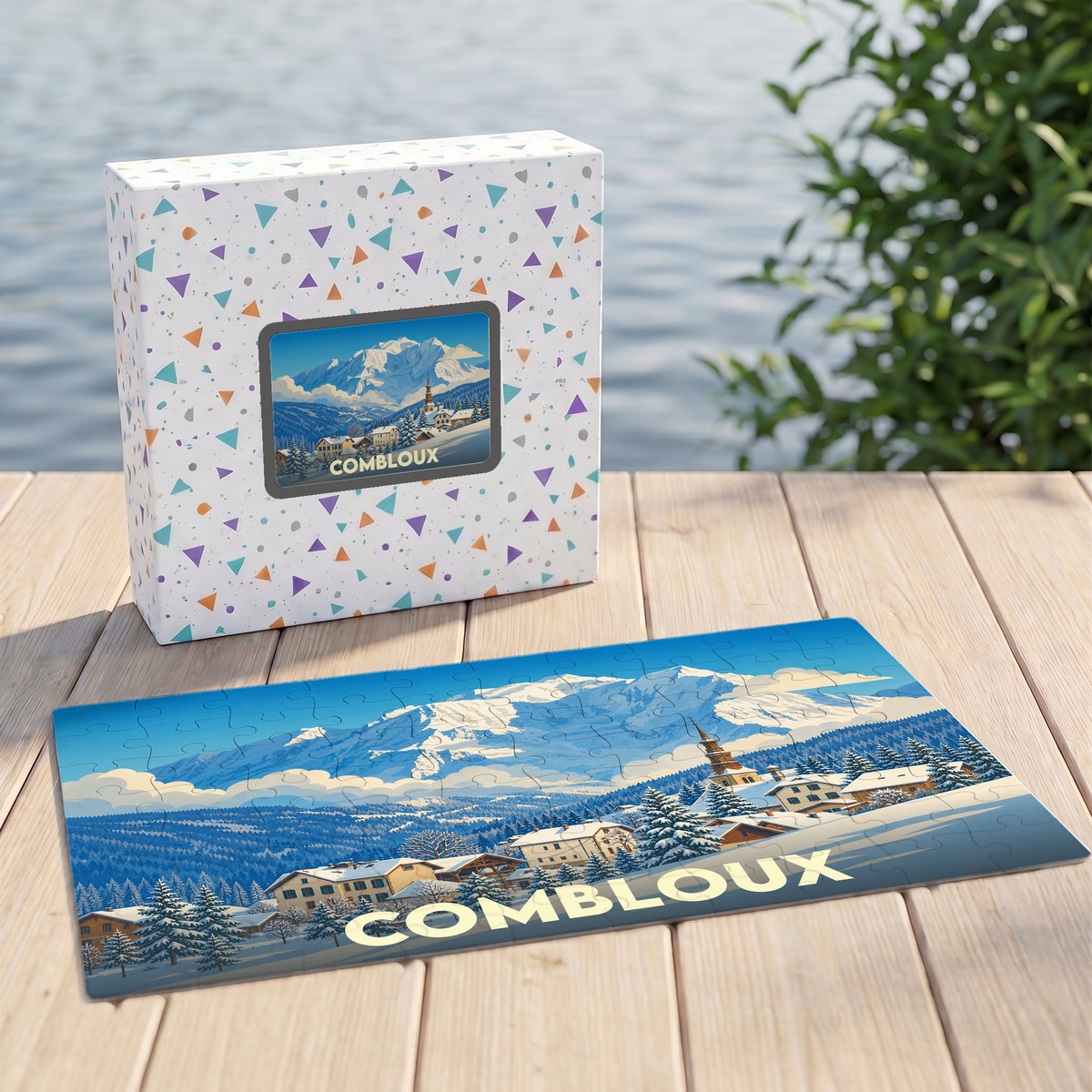 Puzzle souvenir de la ville de Combloux représentant un paysage de montagne enneigé avec une illustration stylisée.