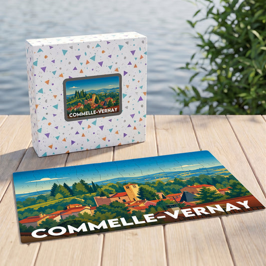 Puzzle souvenir de la ville de Commelle-Vernay avec une illustration paysagère stylisée.