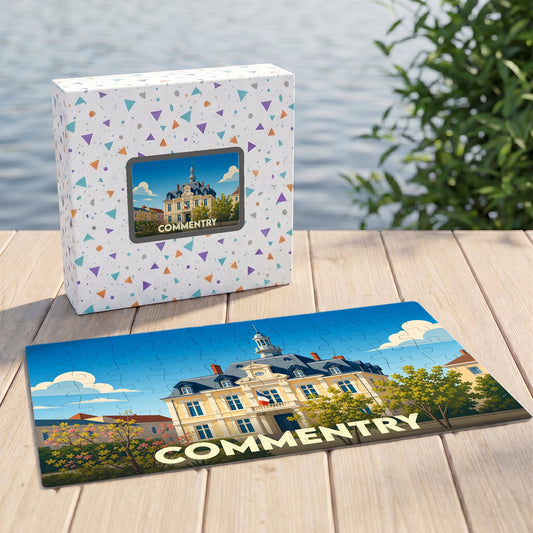 Puzzle souvenir de la ville de Commentry représentant l'hôtel de ville dans un style illustré.