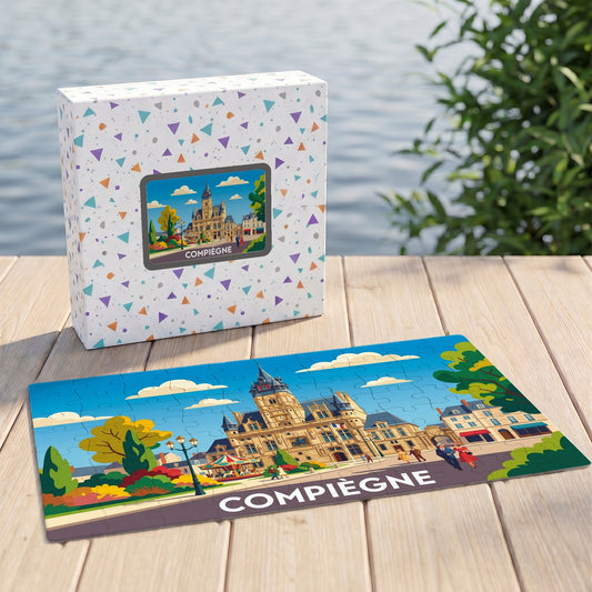 Puzzle souvenir de la ville de Compiègne présentant une illustration colorée et stylisée de son hôtel de ville.