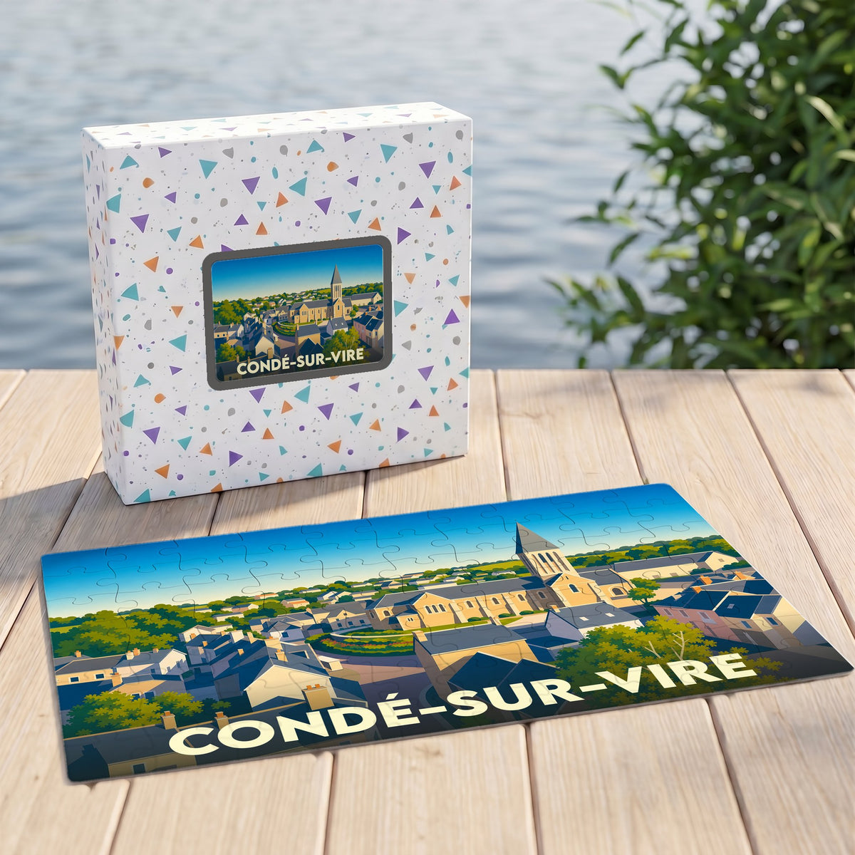 Puzzle souvenir de la ville de Condé-sur-Vire avec une illustration stylisée et colorée.