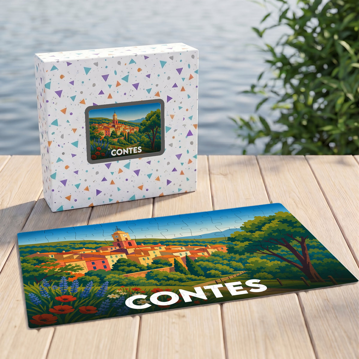 Puzzle souvenir de la ville de Contes avec une illustration stylisée et colorée.