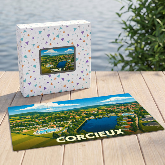 Puzzle souvenir de la ville de Corcieux avec une illustration paysagère stylisée, présenté à côté de sa boîte.