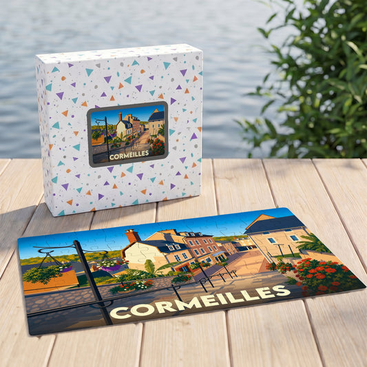 Puzzle souvenir de la ville de Cormeilles illustré d'une scène urbaine colorée et présenté avec sa boîte assortie.