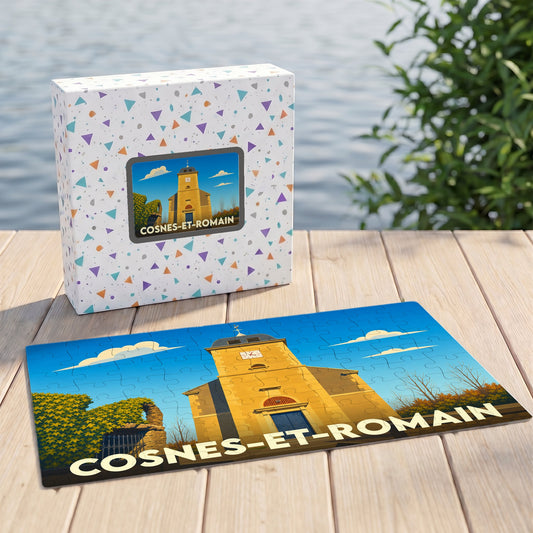 Puzzle souvenir de la ville de Cosnes-et-Romain accompagné de sa boîte, illustrés par un dessin stylisé de l'église locale.