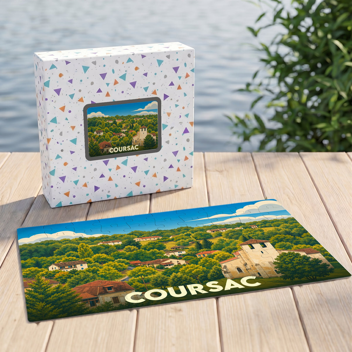 Puzzle souvenir de la ville de Coursac illustré d'un paysage de village verdoyant.