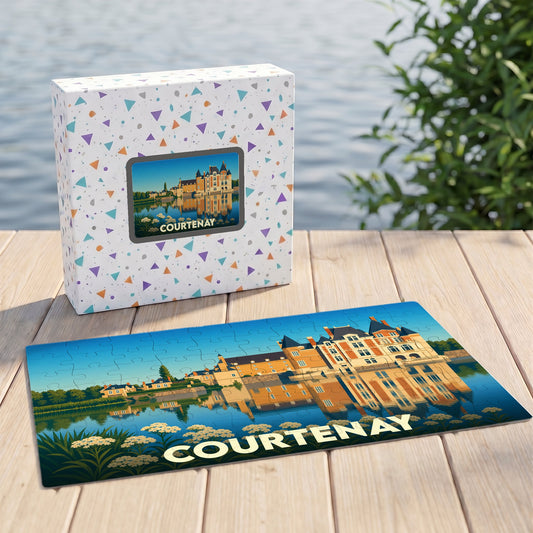 Puzzle souvenir de la ville de Courtenay avec une illustration stylisée de son château et de son reflet sur l'eau.