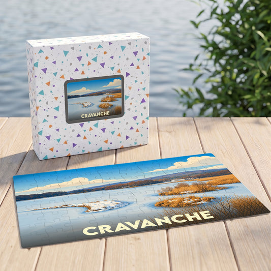Puzzle souvenir de la ville de Cravanche avec une illustration hivernale stylisée.