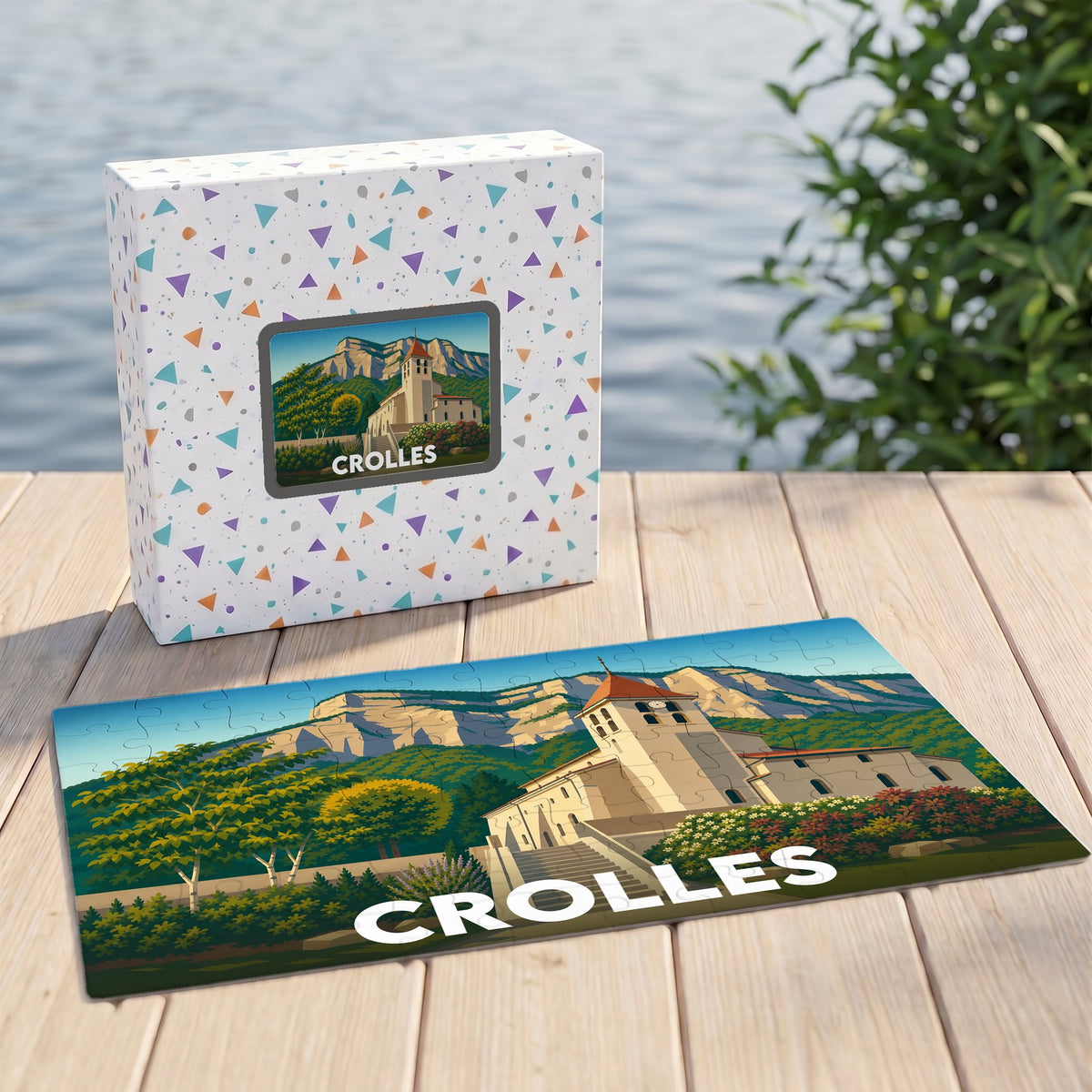 Puzzle souvenir de la ville de Crolles avec une illustration stylisée de son église devant les montagnes.