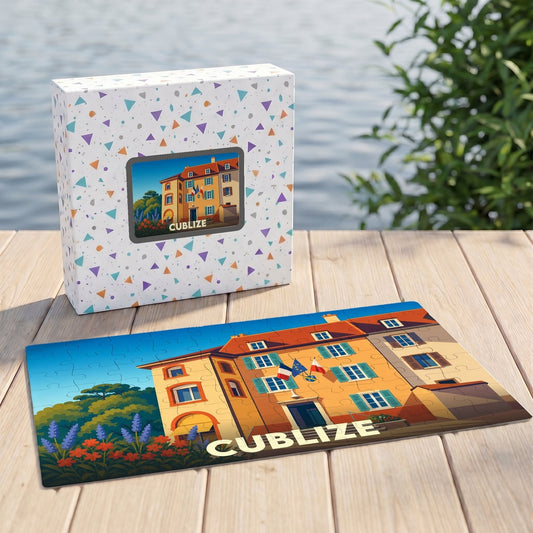 Puzzle souvenir de la ville de Cublize représentant un bâtiment coloré sous un ciel bleu.