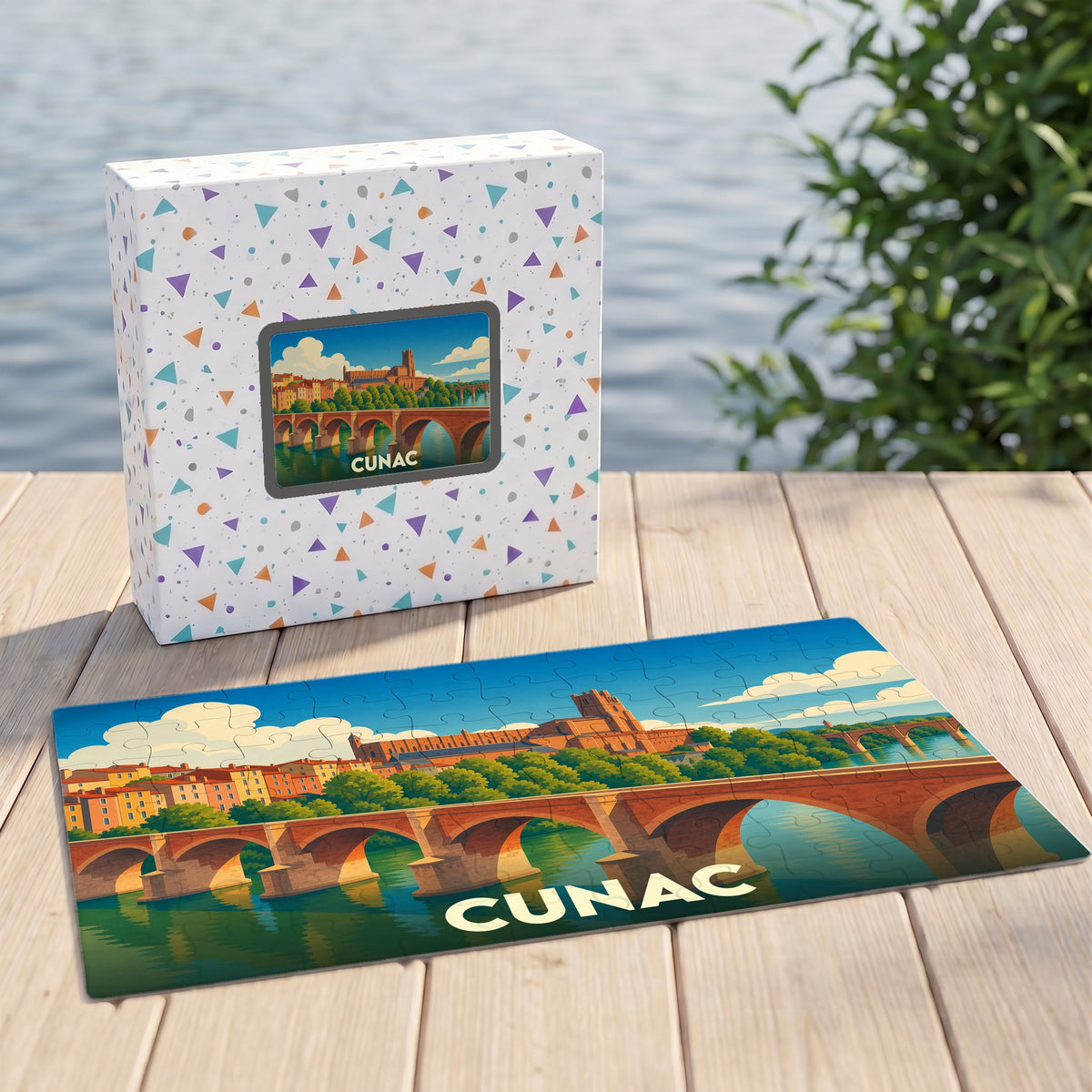 Puzzle souvenir de la ville de Cunac avec une illustration stylisée d'un pont et d'une église.