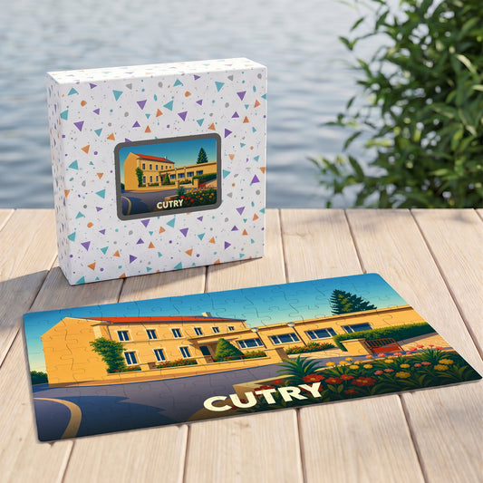 Puzzle souvenir de la ville de Cutry avec une illustration stylisée d'un bâtiment ensoleillé.